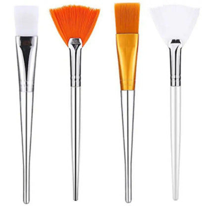 Set of four facial mask applicator brushes in various styles for even product application