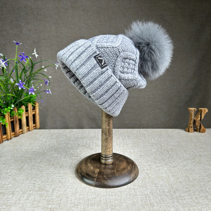 2024 New Women's hats High quality Fur pompom hat Beanies Winter Hats for women Fashion Hat bonnet Female Twist pattern caps