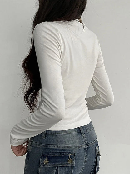 EtherealBe elegant white long sleeve blouse with a fitted design and soft fabric, perfect for layering