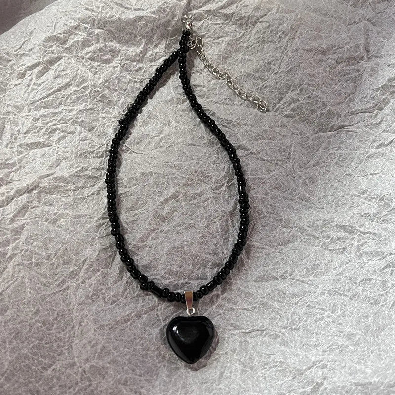 EtherealBe Y2K opal necklace for women featuring a heart-shaped pendant on a black beaded chain