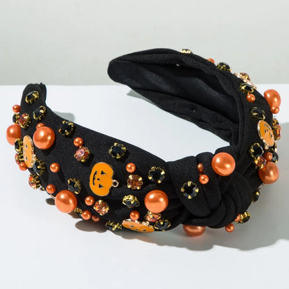 EtherealBe Halloween headbands for women featuring orange pumpkins and shiny beads for festive style