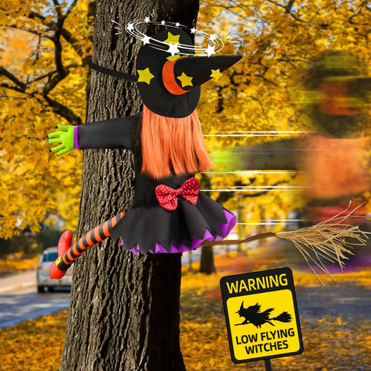 EtherealBe Crashing Witch Halloween outdoor decor with vibrant colors and a whimsical design on a tree