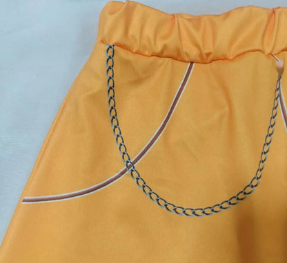 Zoey Rumi kids costume orange elastic waist skirt with faux chain print and piped pocket detail