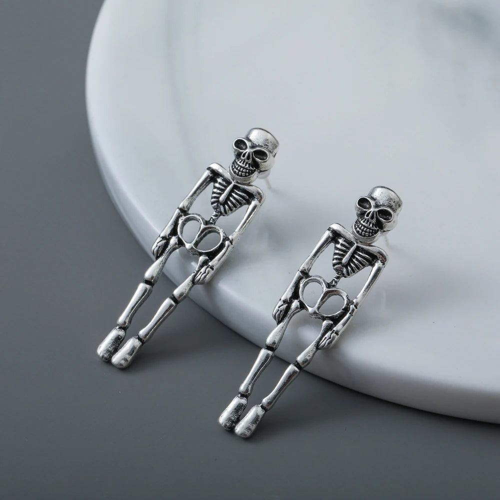 EtherealBe Halloween skeleton earrings for women made of silver-toned metal with detailed skeleton design