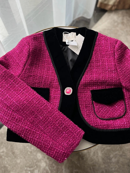 Stylish sweet pink tweed blazer for ladies with black trim and pockets