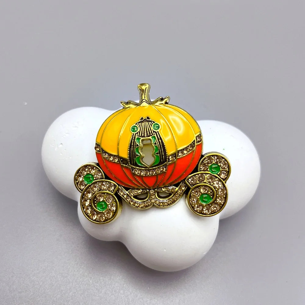 Colorful pumpkin carriage Halloween brooch pin with sparkling details for festive outfits