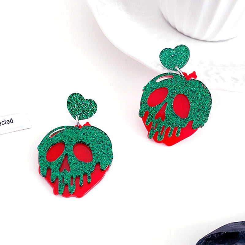 EtherealBe Halloween earrings for women featuring green skulls with heart accents and glitter finish