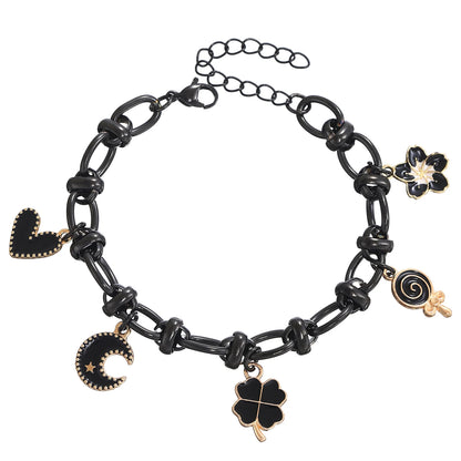 EtherealBe Halloween charm bracelet for women featuring black and gold charms and adjustable chain