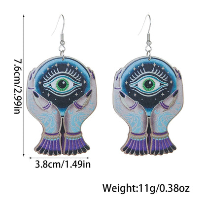 EtherealBe Halloween devil eye earrings featuring hands holding an eye design with vibrant colors