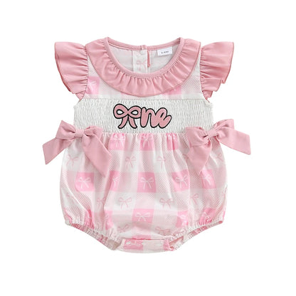 EtherealBe plaid patchwork romper for infants with pink ruffle sleeves and playful design