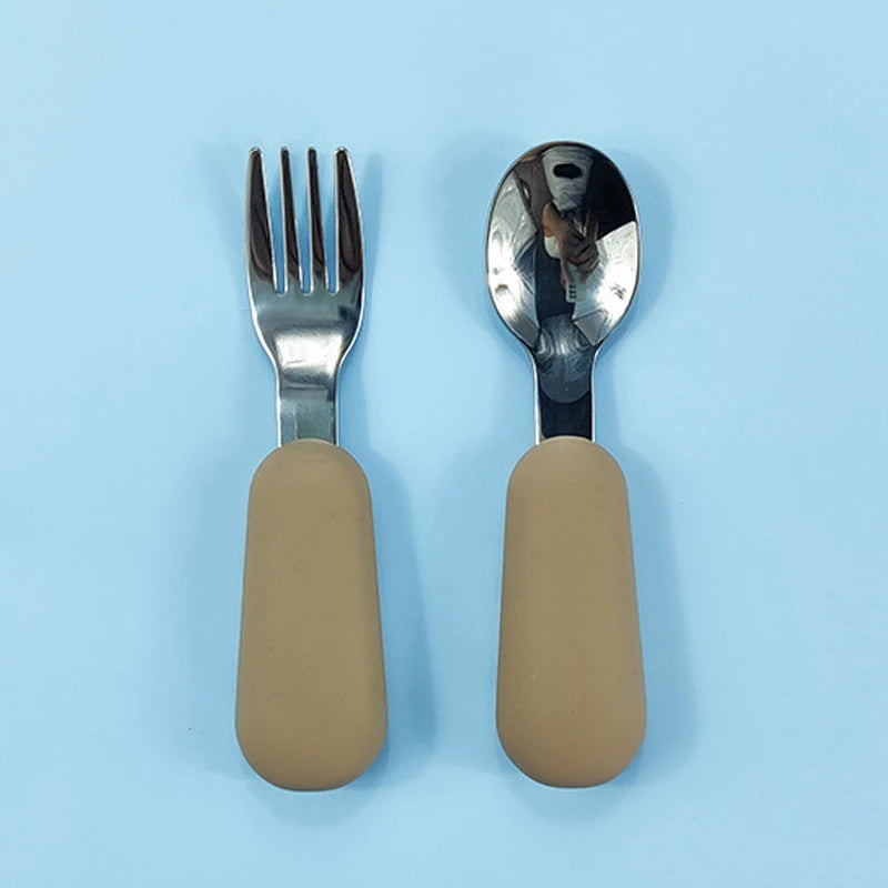 EtherealBe stainless steel baby utensils set featuring a fork and spoon with soft silicone handles