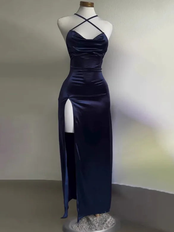 Elegant navy backless evening sling dress with a high slit and crisscross straps for a stunning look