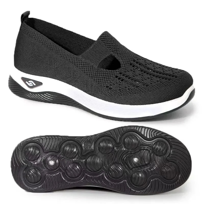 EtherealBe lightweight women's walking flats in black with breathable knit upper and flexible sole