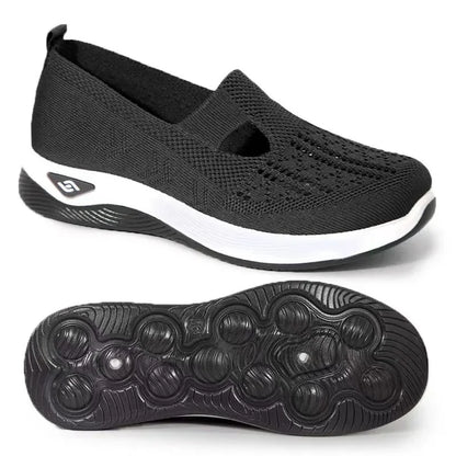 EtherealBe lightweight women's walking flats in black with breathable knit upper and flexible sole