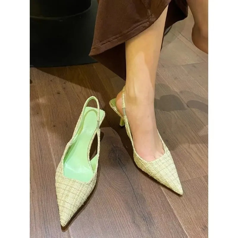 EtherealBe stylish black stilettos for wide feet featuring a pointed toe design and slingback style