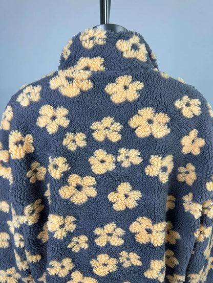 EtherealBe cozy lambskin coat for women with a floral pattern and soft fleece texture on the back