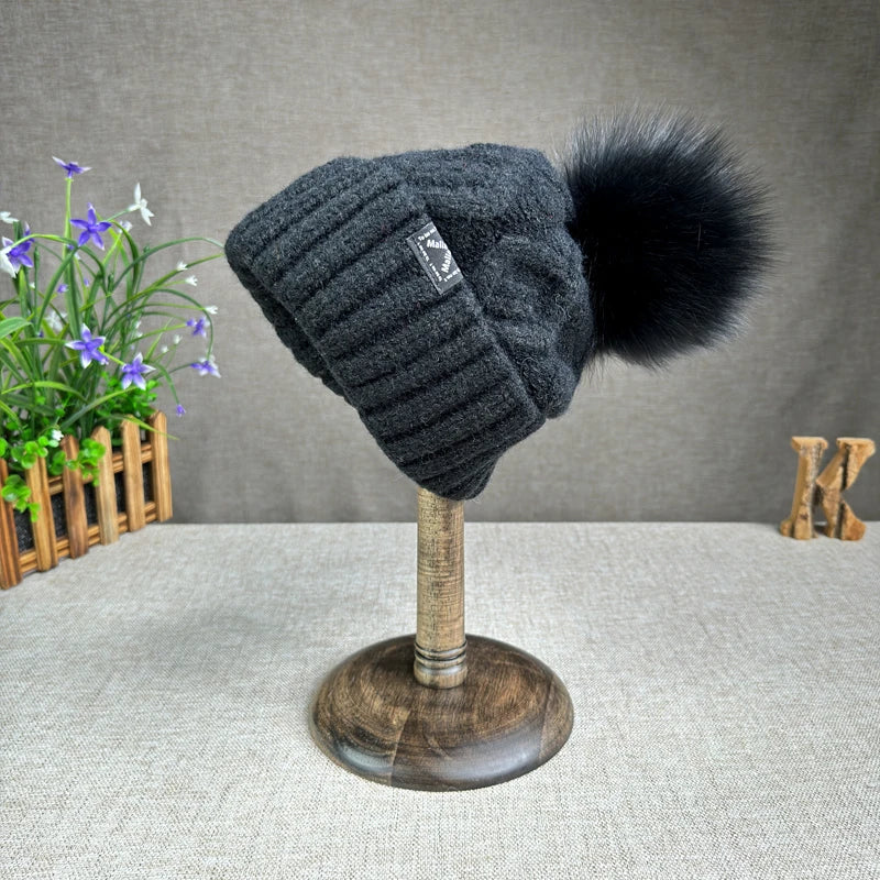 2024 New Women's hats High quality Fur pompom hat Beanies Winter Hats for women Fashion Hat bonnet Female Twist pattern caps