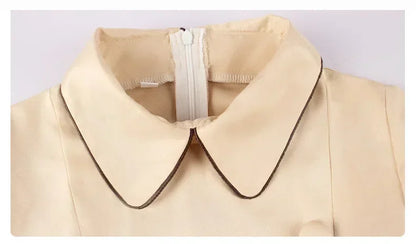 Close-up of the collar on an EtherealBe M3GAN cosplay costume for kids in soft fabric