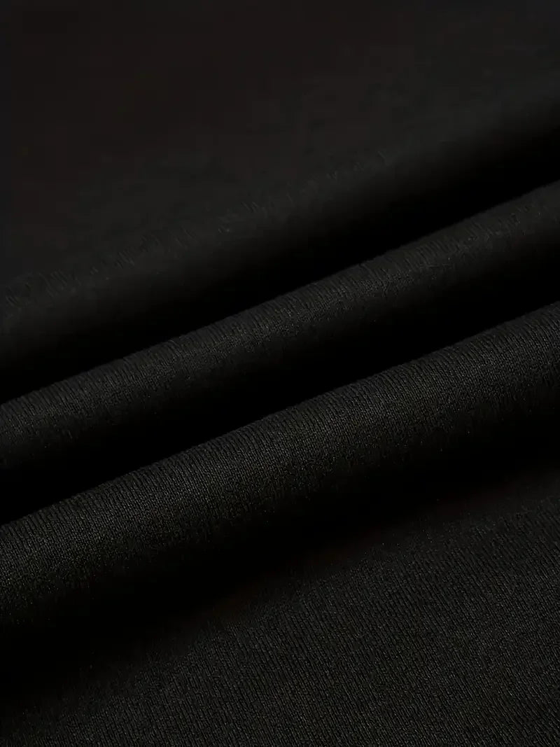 Close-up of soft black fabric showcasing the material for women's Halloween skeleton hoodie