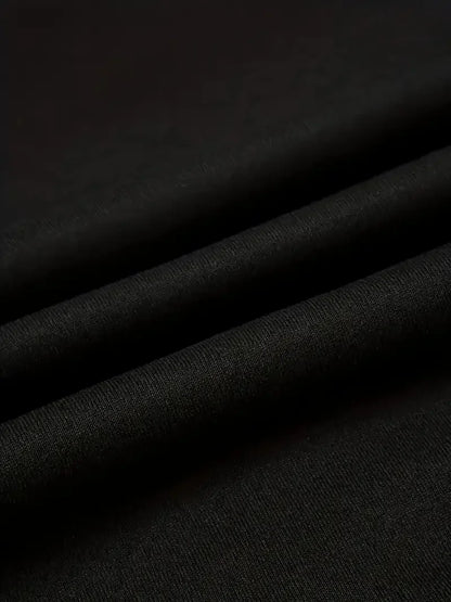 Close-up of soft black fabric showcasing the material for women's Halloween skeleton hoodie