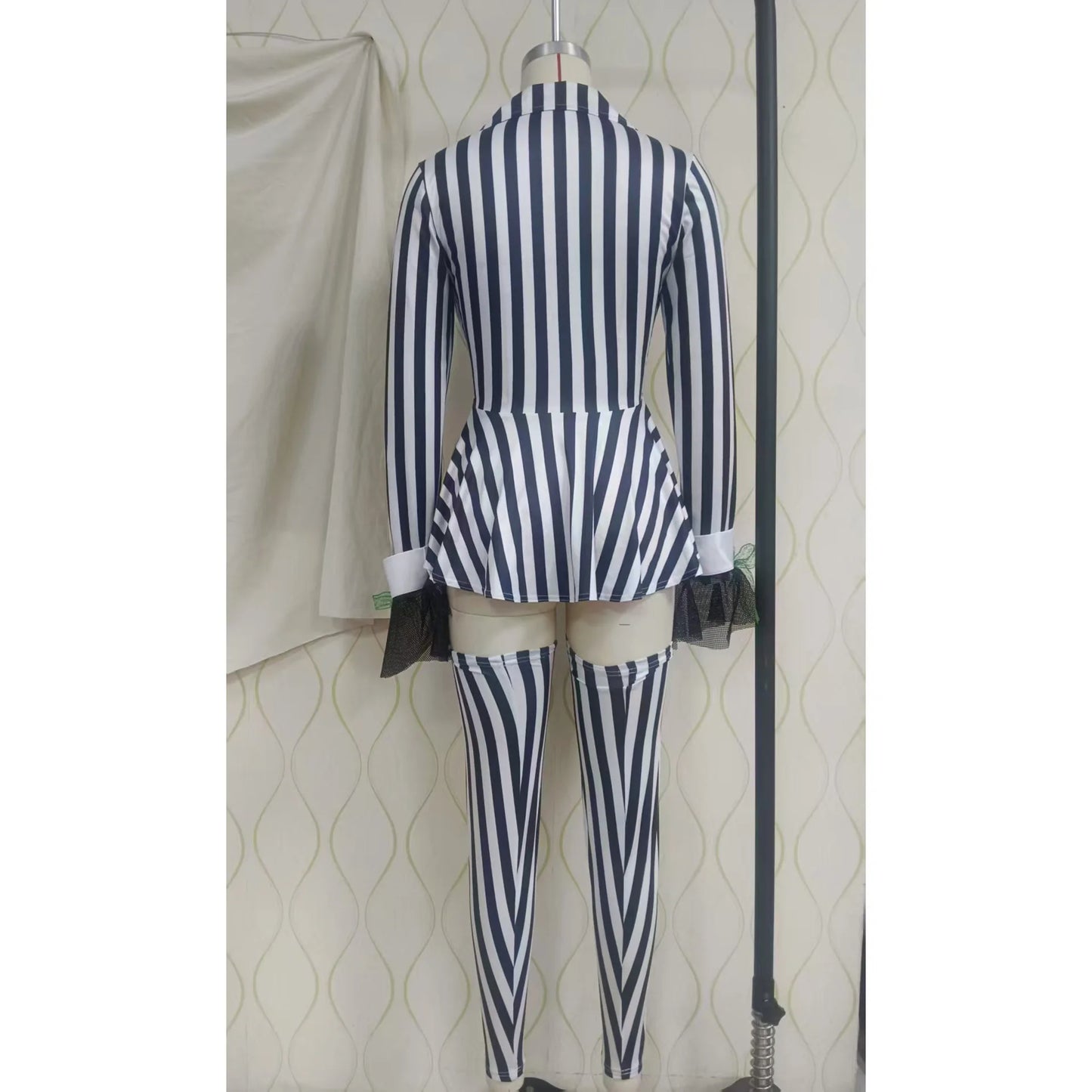 Back view of women's beetle cosplay costume featuring black and white striped design with elegant details