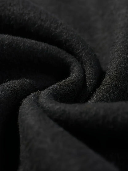 Close-up of soft fabric showcasing a black Halloween spooky hoodie for women