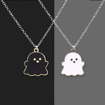EtherealBe Halloween ghost pendant necklace in black and white on delicate chains