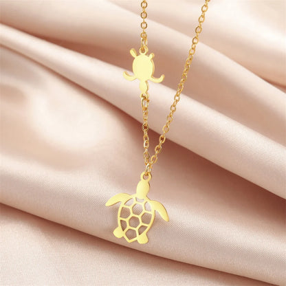 Stylish gold sea turtle pendant necklace for women with intricate design and delicate chain