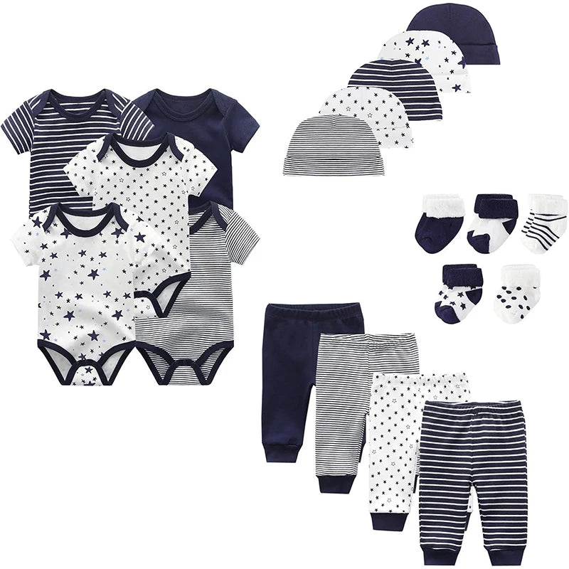 EtherealBe newborn unisex layette set featuring various onesies, pants, hats, and socks in navy and white patterns