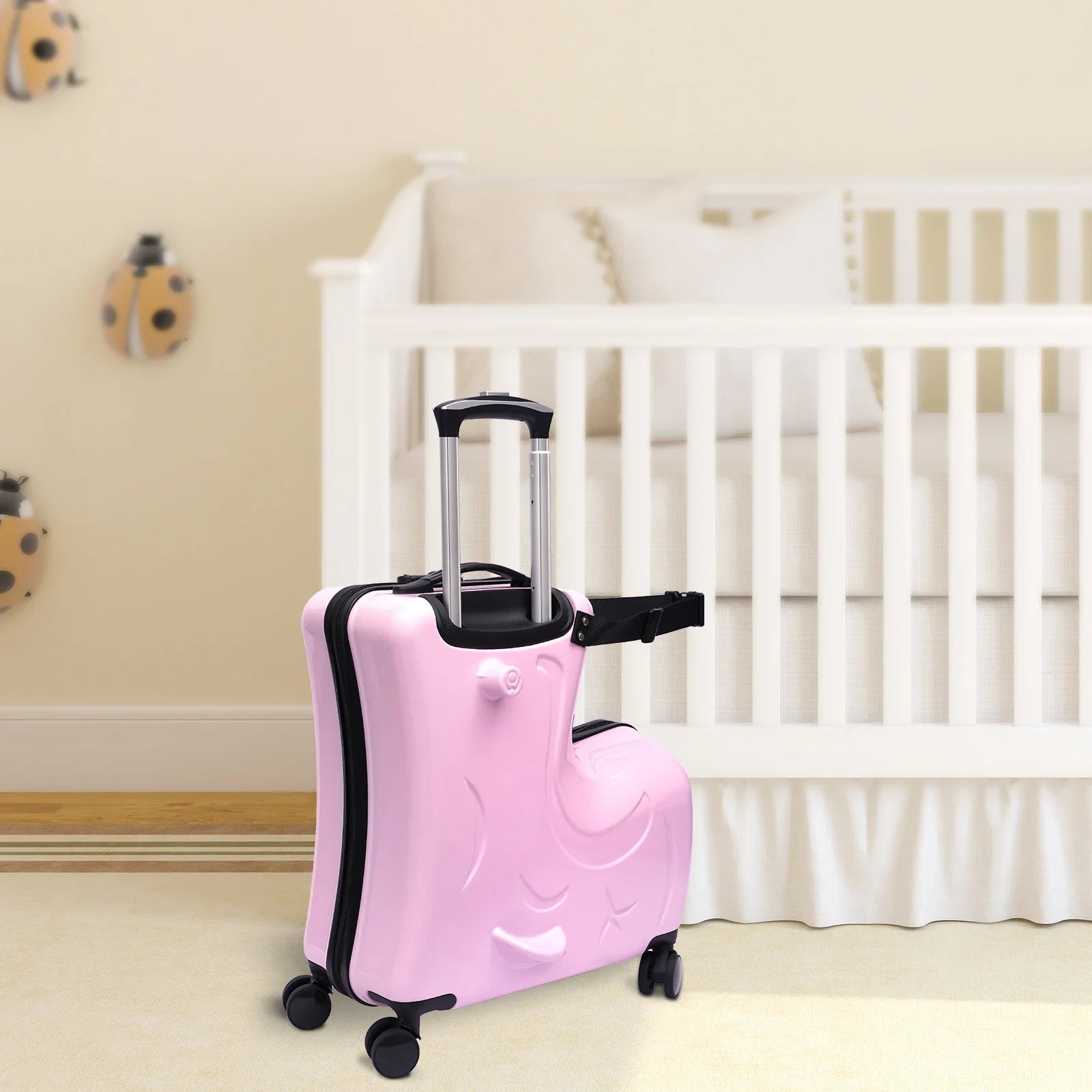 EtherealBe Kids ride-on travel luggage in pink design with easy-rolling wheels for fun travel