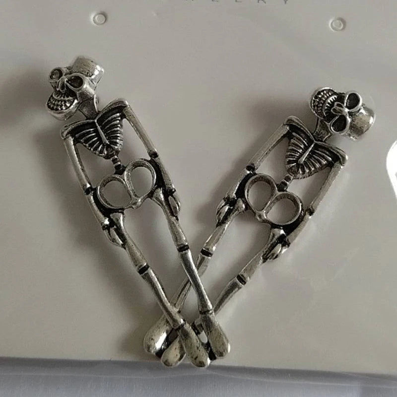 EtherealBe Halloween skeleton earrings for women featuring detailed silver skeleton designs