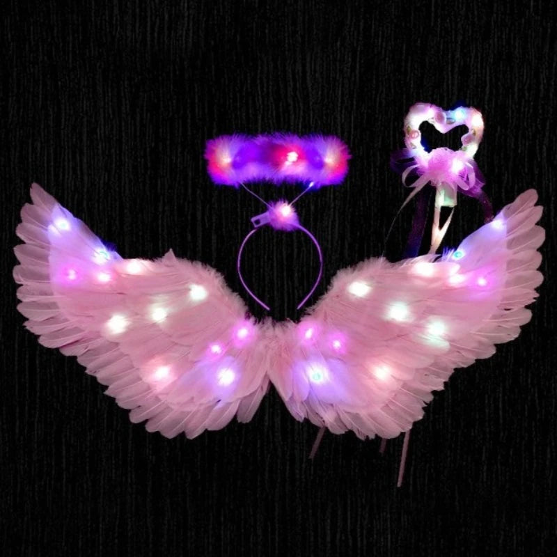 Light up angel costume for girls featuring pink wings, halo, and wand with colorful lights