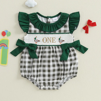 Plaid patchwork romper for infants with ruffled sleeves and green accents for playful style