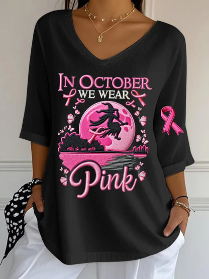EtherealBe women's Halloween graphic t-shirt with witch silhouette and pink breast cancer awareness ribbon