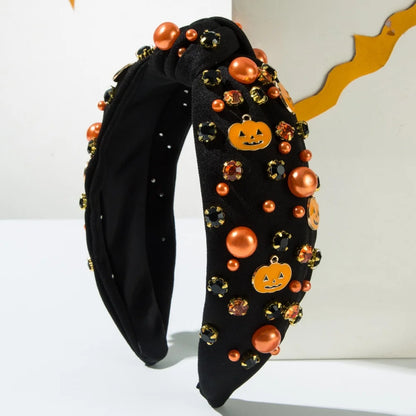 Spooky Halloween headbands for women adorned with pumpkins and colorful gems for festive celebrations