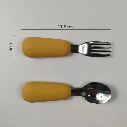 Yellow ergonomic stainless steel baby utensils set with fork and spoon for easy handling