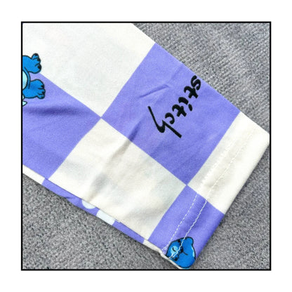 Children's Stitch pajamas set featuring a playful blue and purple checkerboard design