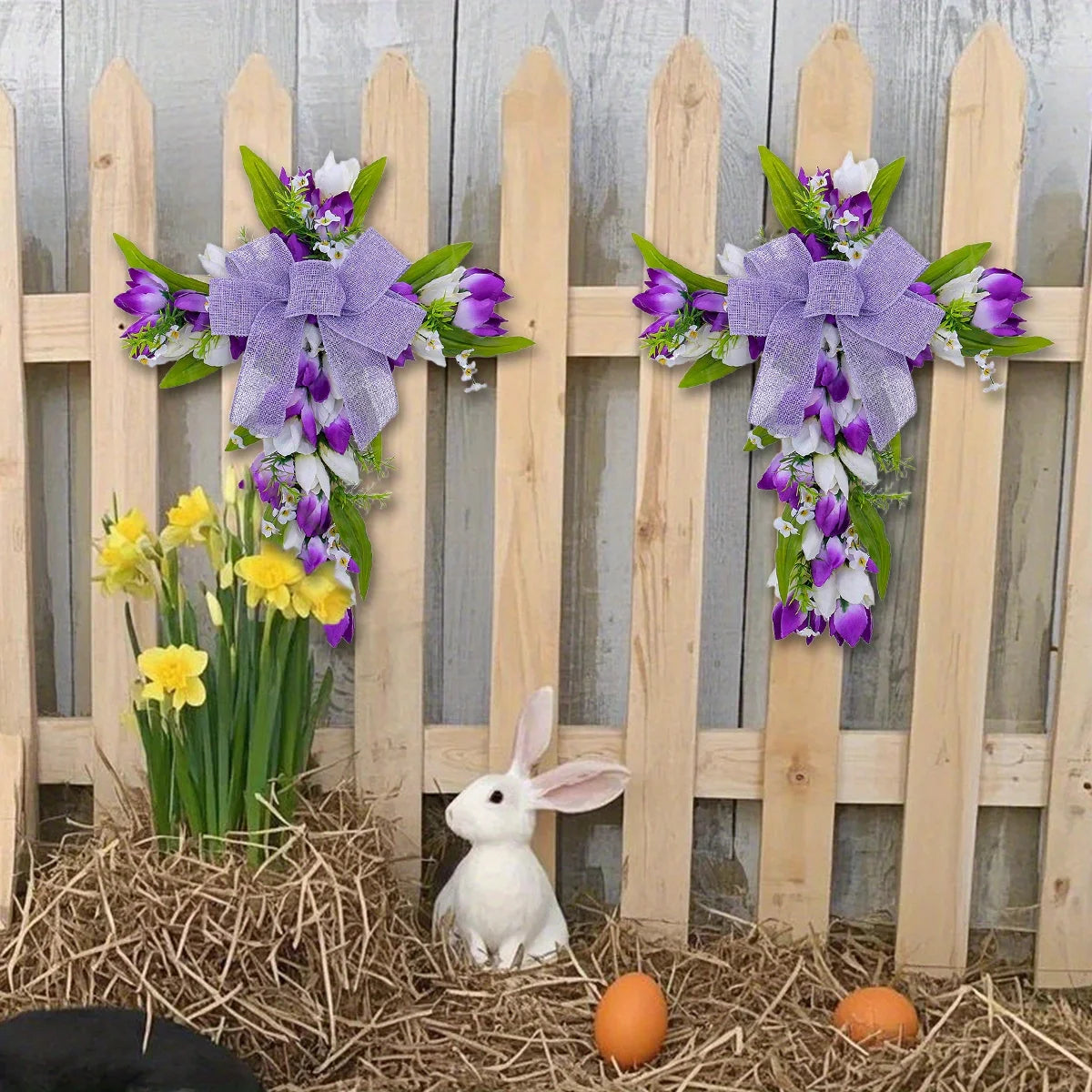 Purple tulip cross wall hanging decorated with vibrant flowers and a ribbon, perfect for spring decor
