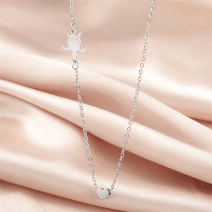 Delicate sea turtle pendant necklace for women with a charm on a silver chain