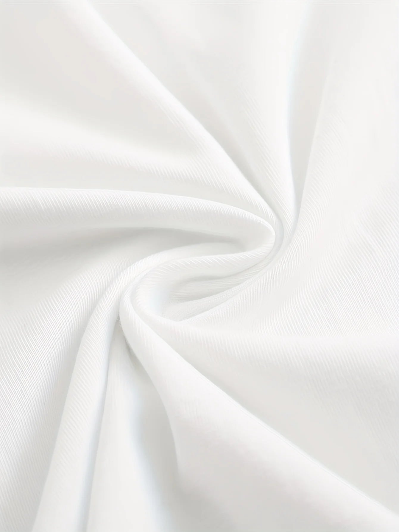 Soft white fabric ideal for a stylish women's heart print shirt with smooth texture