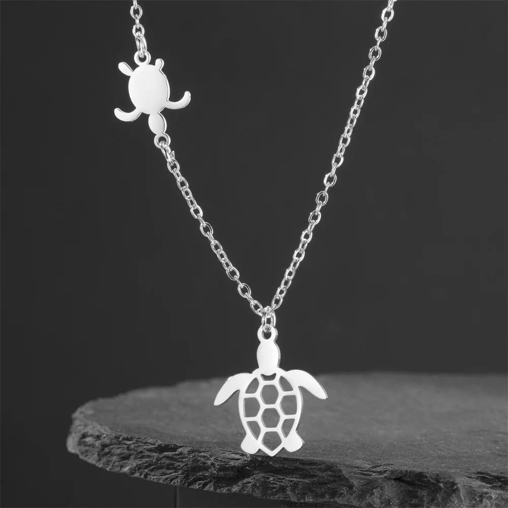 EtherealBe sea turtle pendant necklace for women featuring delicate silver chain and turtle charms