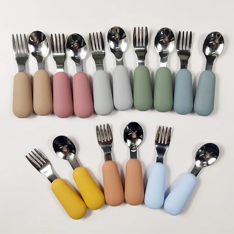 Colorful stainless steel baby utensils set with soft grip handles for easy feeding