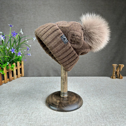 2024 New Women's hats High quality Fur pompom hat Beanies Winter Hats for women Fashion Hat bonnet Female Twist pattern caps
