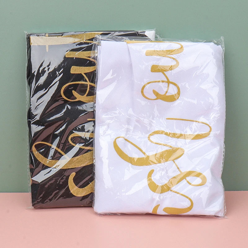 EtherealBe makeup artist kitchen apron in black and white with stylish gold lettering in packaging