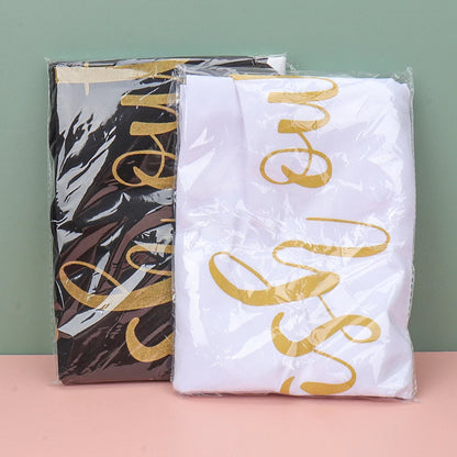 EtherealBe makeup artist kitchen apron in black and white with stylish gold lettering in packaging