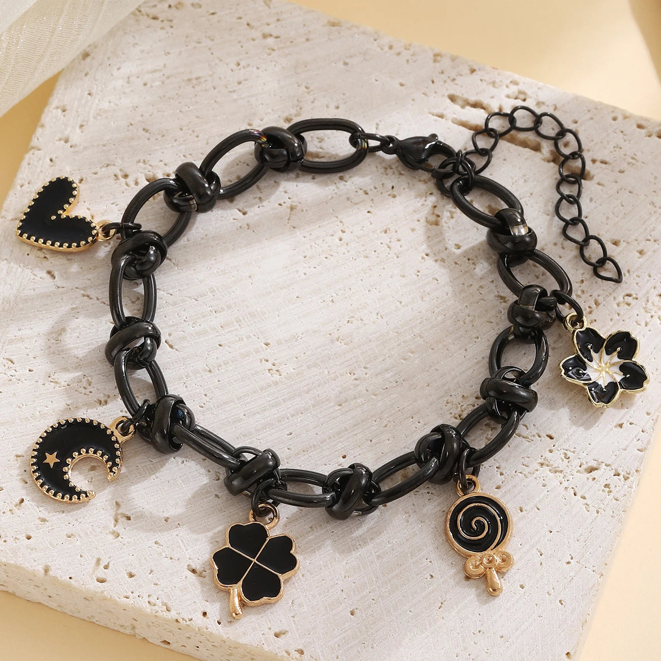 EtherealBe Halloween charm bracelet for women featuring black links and spooky charms
