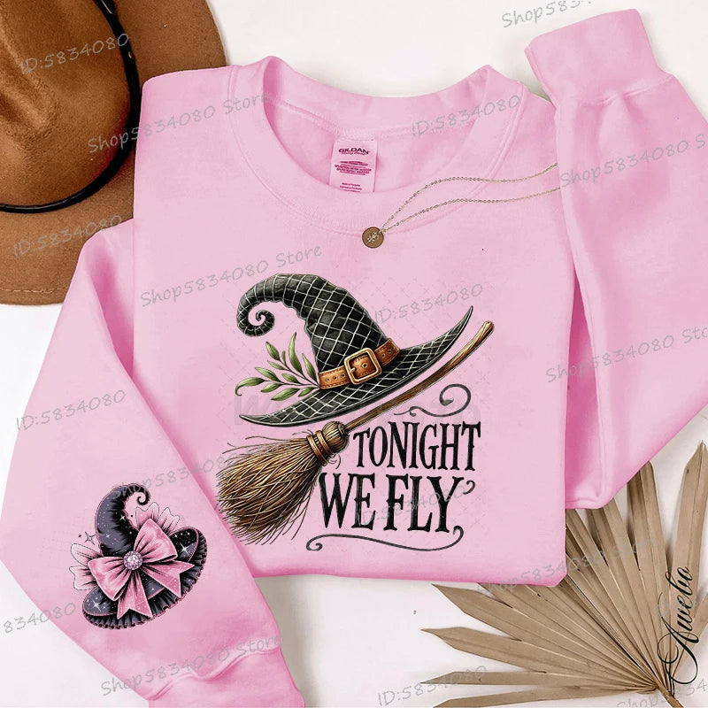 Pink Halloween witch hat sweatshirt for women with a whimsical design and cute graphics