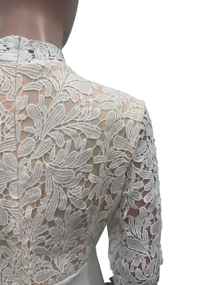 Back detail of an elegant lace party dress for women showing high neck floral lace and sheer long sleeve