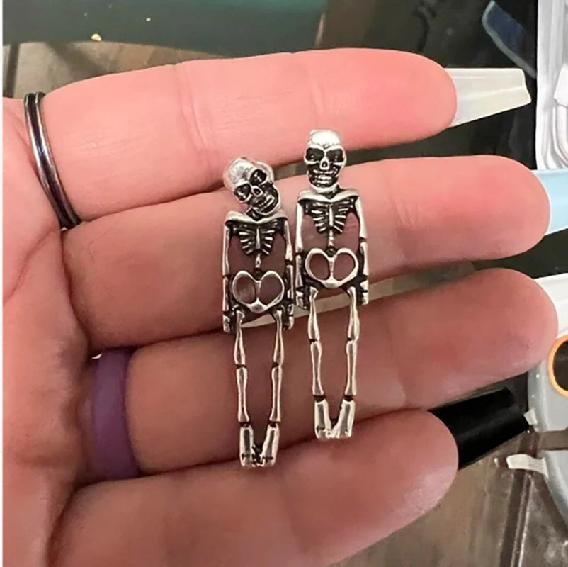EtherealBe Halloween skeleton earrings for women, showcasing detailed silver skeleton design