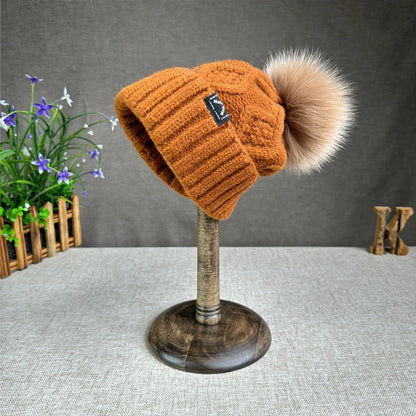 2024 New Women's hats High quality Fur pompom hat Beanies Winter Hats for women Fashion Hat bonnet Female Twist pattern caps